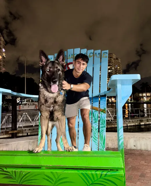 Nicolas with his German Shepherd